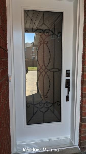 Single entry door. Blackburn iron glass insert